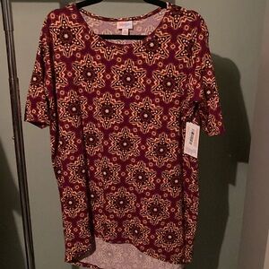 Lularoe xs purpleish pink star print Irma shirt